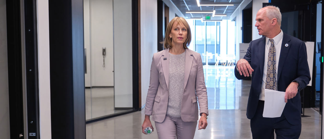 Lincoln Mayor Leirion Gaylor Baird listens as SCC President Dr. Paul Illich gives her a tour of the Sandhills Global Technology Center on the SCC Lincoln Campus. 