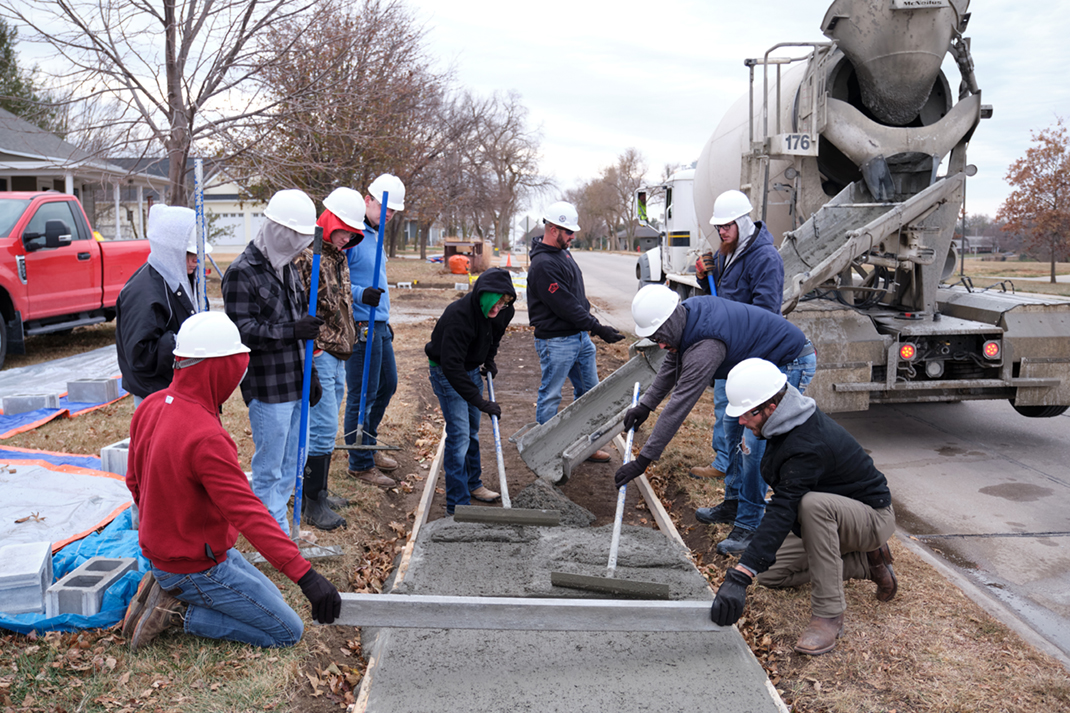 Students working with concrete