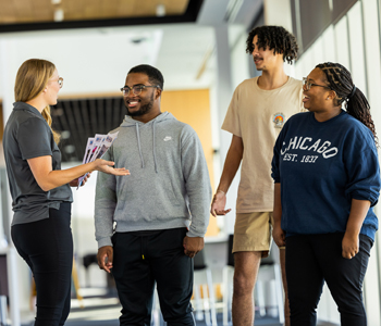 Admissions Rep with prospective students on a tour